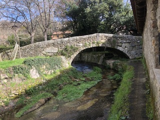 Stone arched bridge crossing the Francia river.